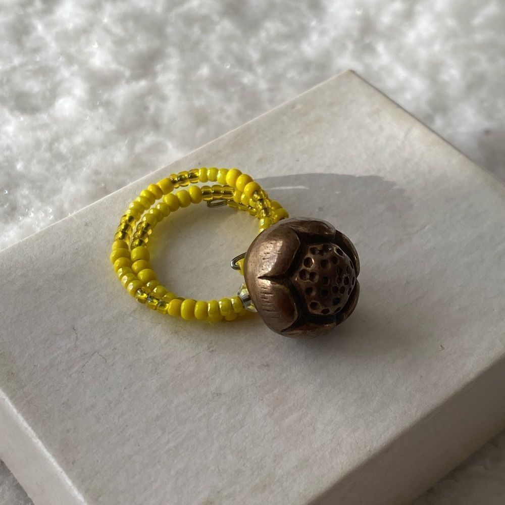 Yellow Beaded Ring with Brass Color Flower Detail